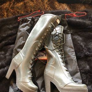 Hunter rain boots with 4 inch heels, size 6.